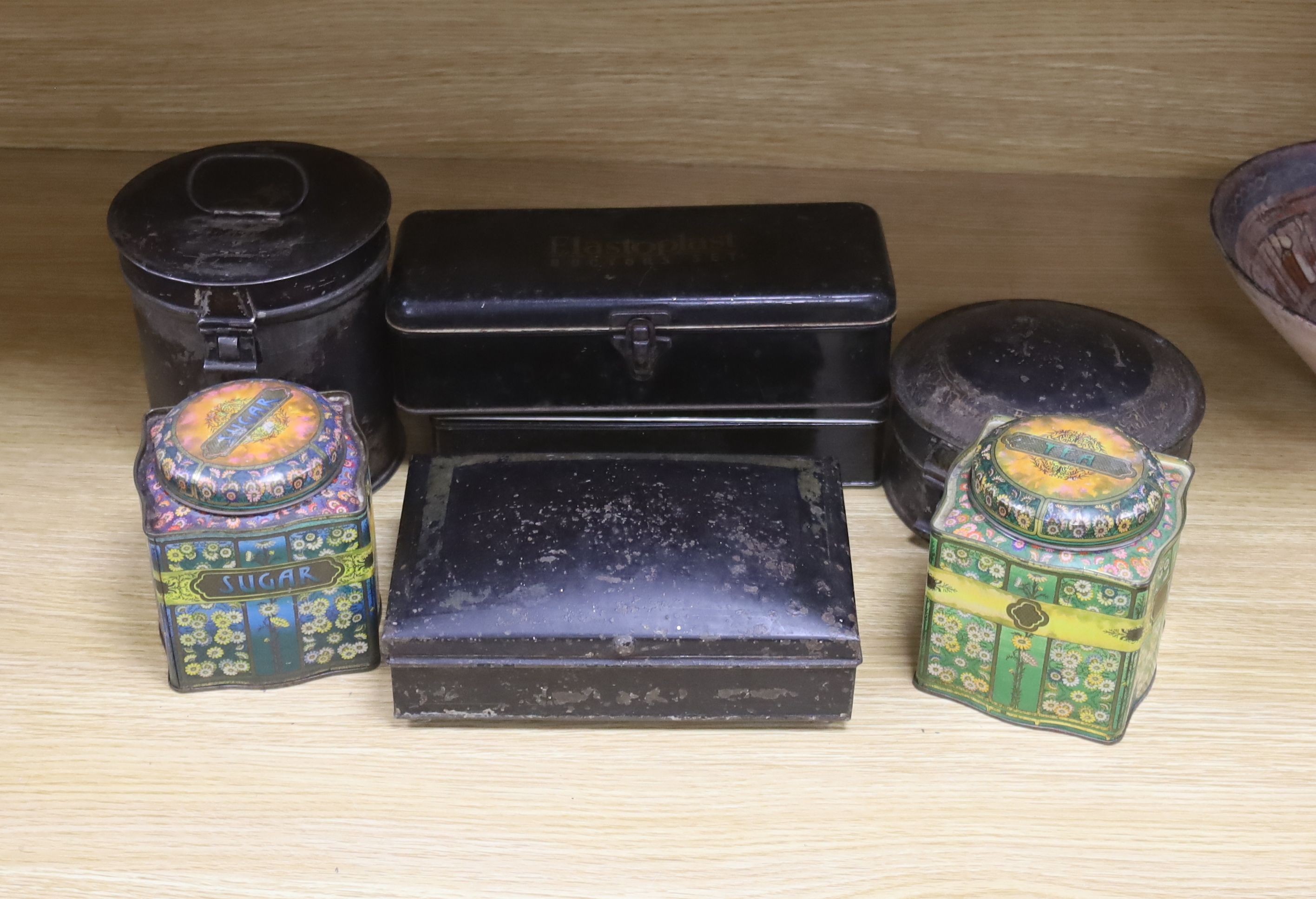 Two 19th century Toleware spice boxes, widest 20cm, and five storage tins